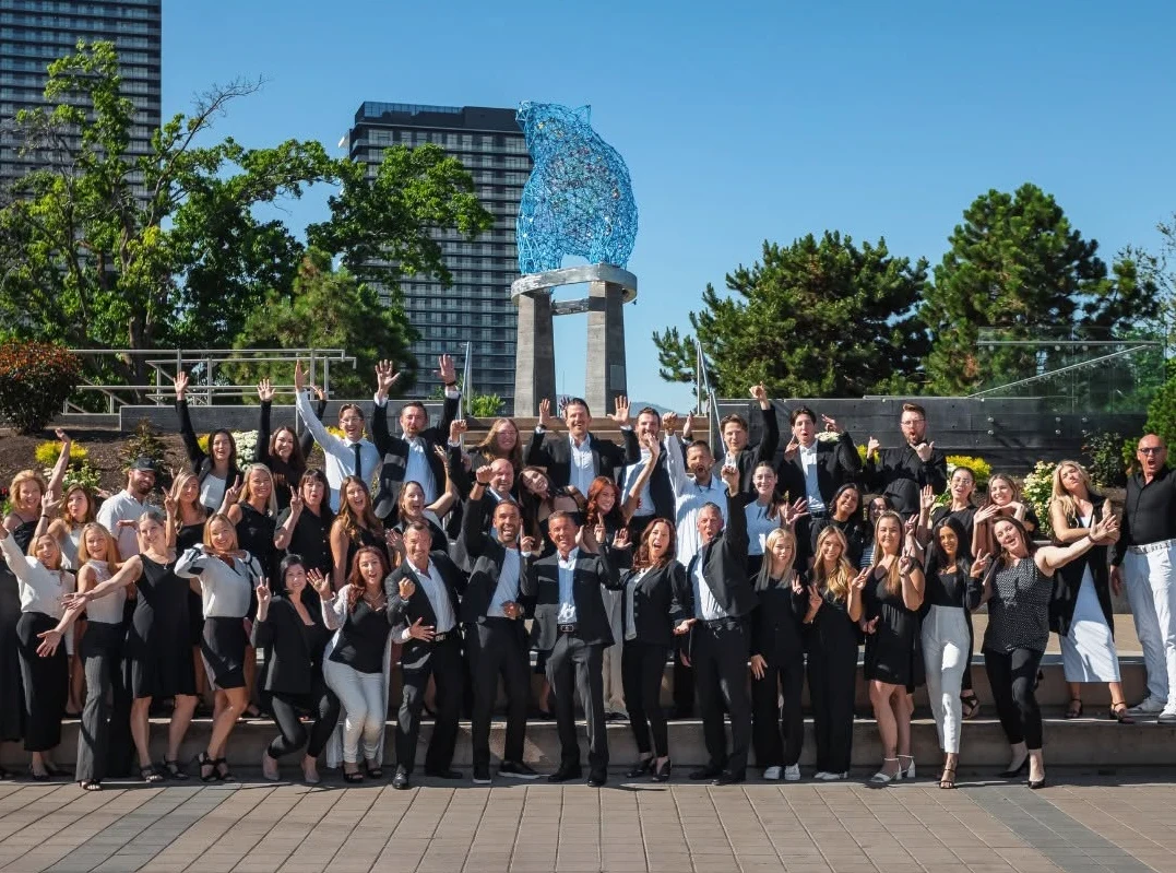 The Vantage West Realty team gathered outdoors in Kelowna